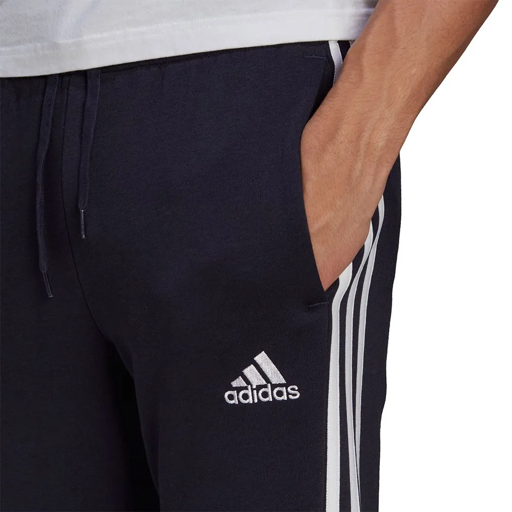 Adidas Sportswear Essentials Fleece Tapered Cuff 3-Stripes Pants 3 Adidas Sportswear Essentials Fleece Tapered Cuff 3-Stripes Pants - Image 3